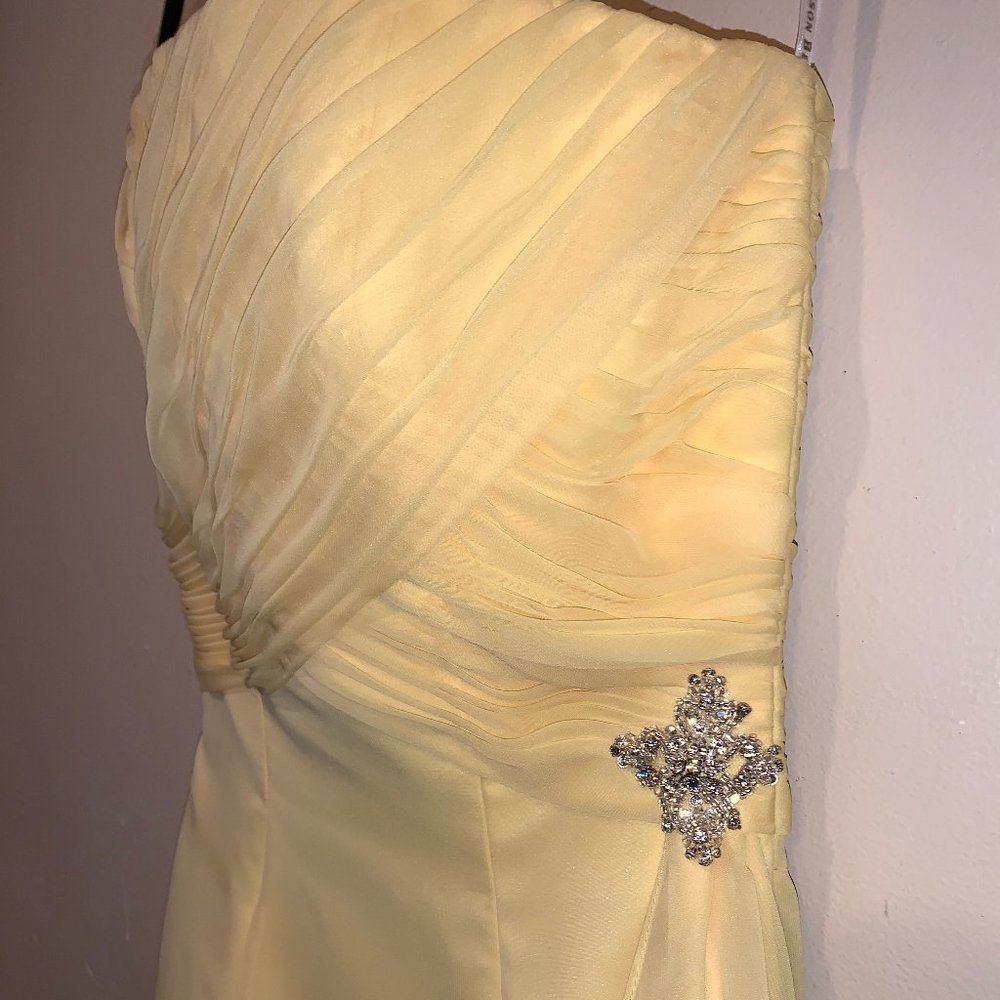 Stunning strapless yellow fit and flare event dress- knee length. Brand new